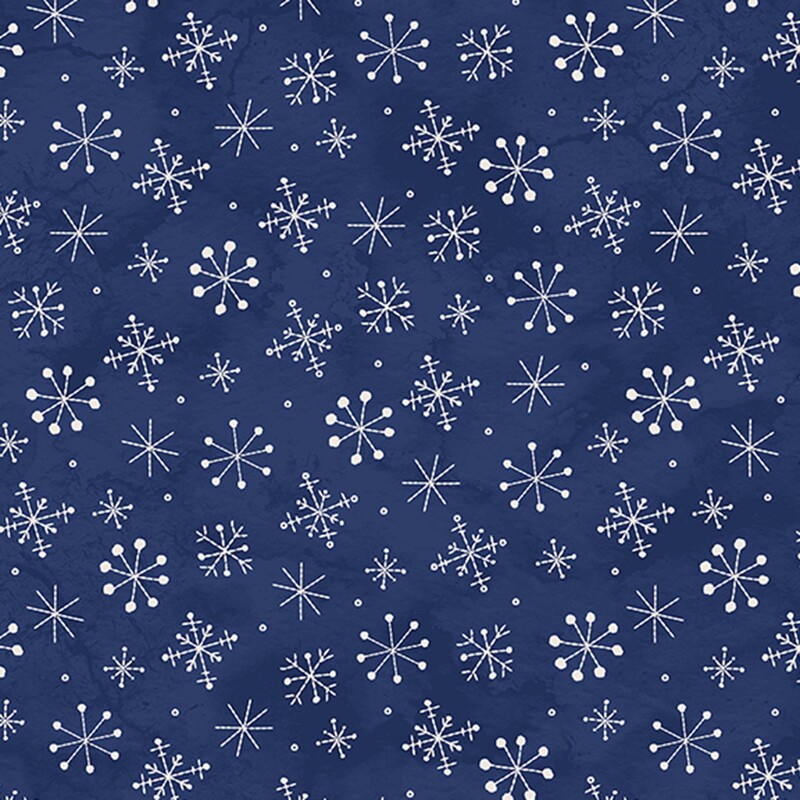 Mottled navy blue fabric with a scattered design of white snowflakes.