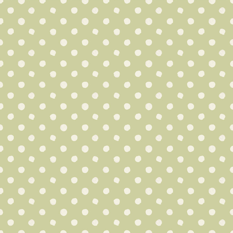 Green fabric with hand-drawn white dots.