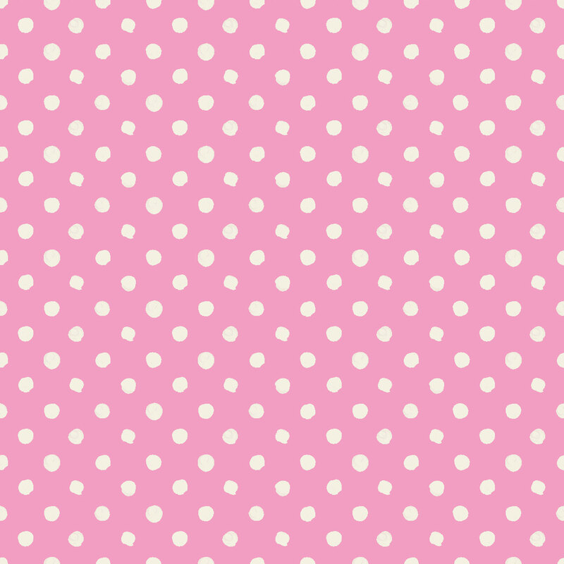 Pink fabric with hand-drawn white dots.