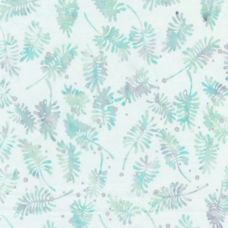 A pale aqua batik fabric with scattered blue, teal, and lavender pine-like sprigs and metallic silver dots.