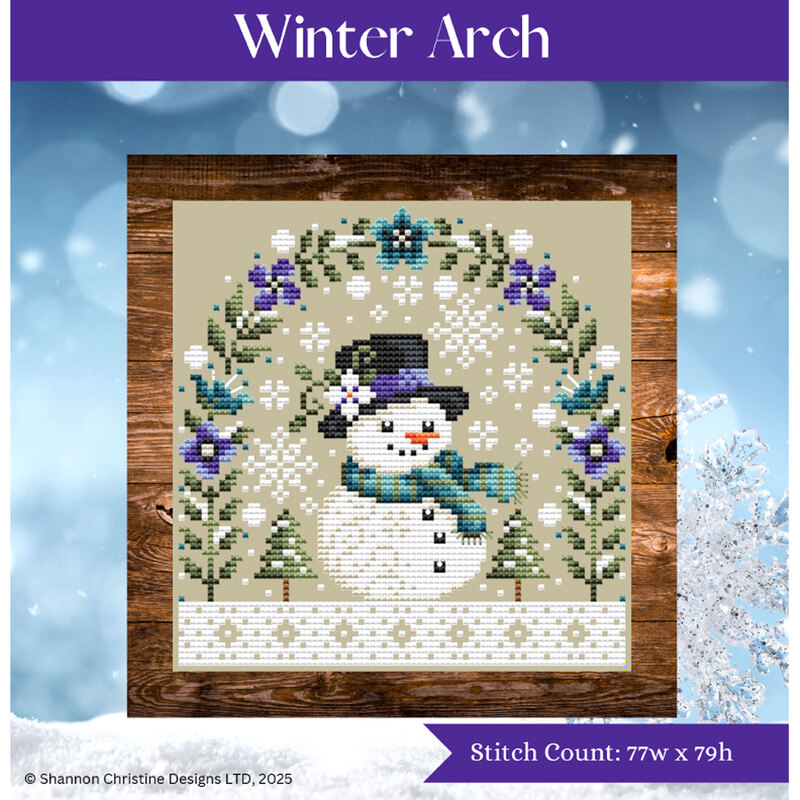 A winter cross stitch with a snowman under an arch made of blue and white flowers and greenery among snowflakes.