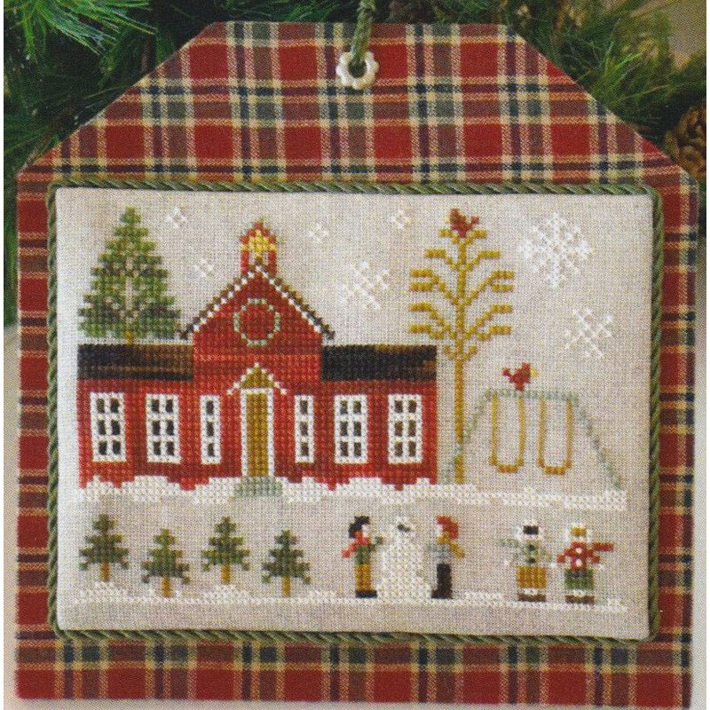 Cross-stitch pattern for Little House Needleworks, “Hometown Holiday – Schoolhouse.”