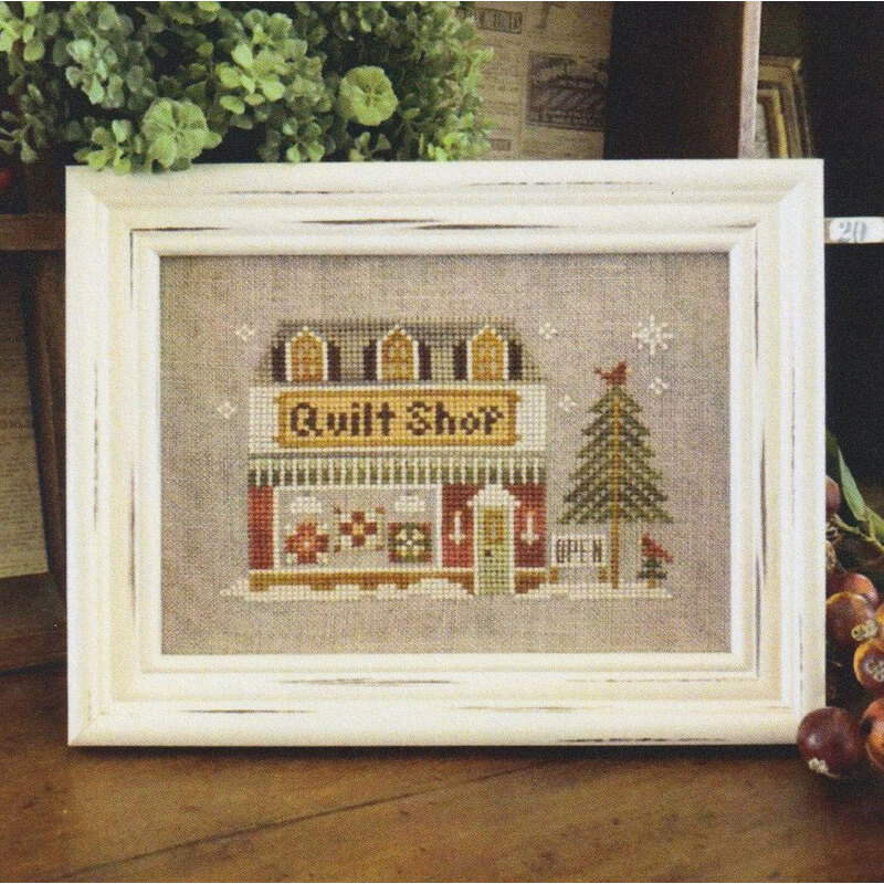 Cross-stitch pattern for Little House Needleworks, “Hometown Holiday – Quilt Shop.”