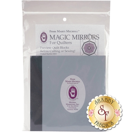 Package of Magic Mirrors for quilters, featuring a label that states its purpose for previewing quilt blocks before cutting or sewing. The product is from Marti Michell and includes an image of a hexagon.