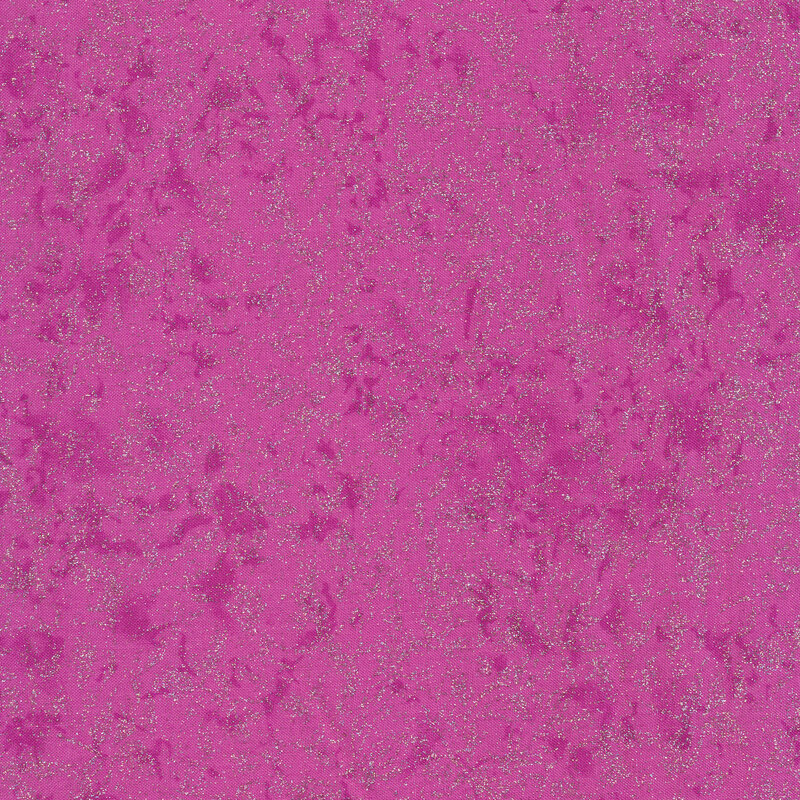 Tonal magenta fabric features mottled design with metallic frost accents