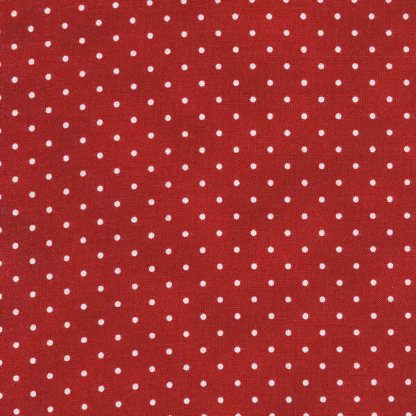Fabric features tiny cream polka dots on mottled crimson red | Shabby Fabrics