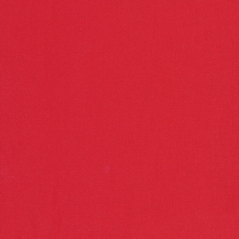 Bright pinkish red solid fabric swatch.