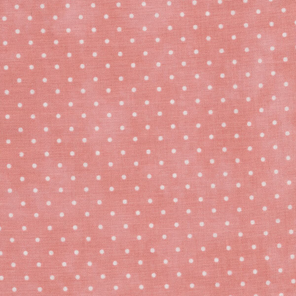 Fabric features tiny cream polka dots on mottled dusty pink | Shabby Fabrics