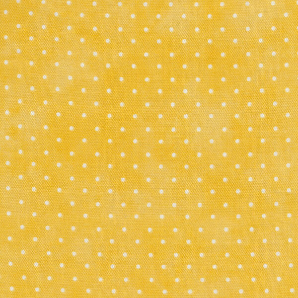 Fabric features tiny cream polka dots on mottled light mustard yellow | Shabby Fabrics