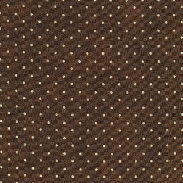 A textured dark brown fabric with a pattern of small, evenly spaced white polka dots.