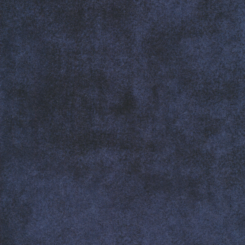 A smooth, dark blue textured fabric.