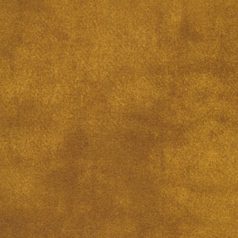 Mottled dark golden flannel fabric