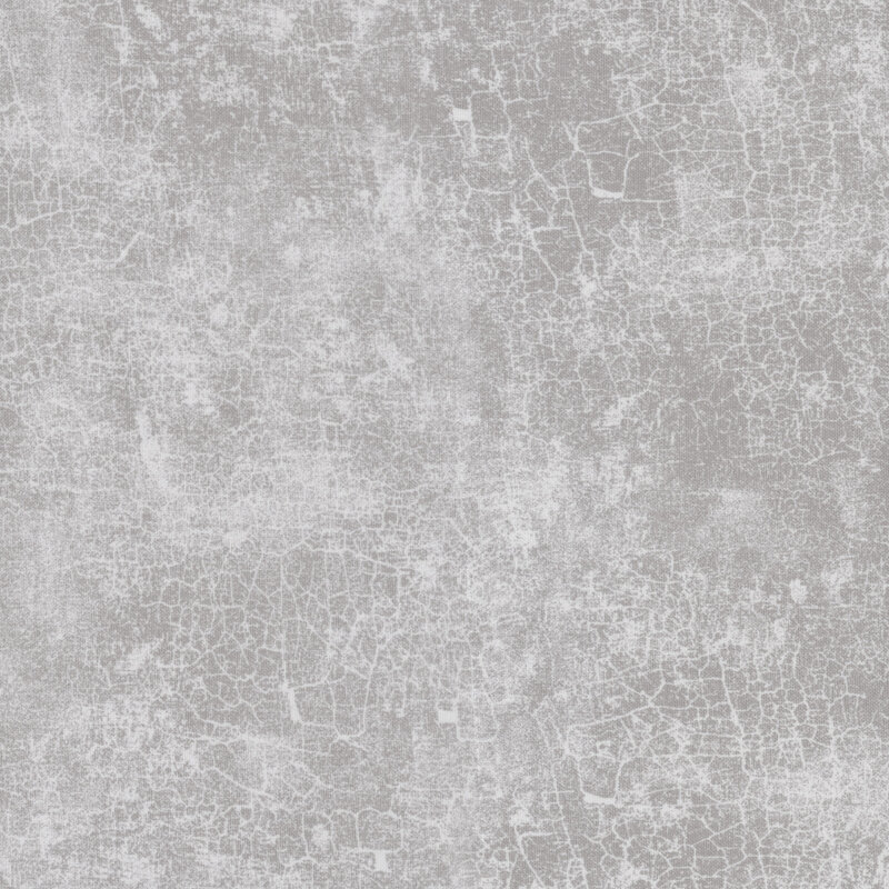 fabric pattern of gray textures and cracked lines