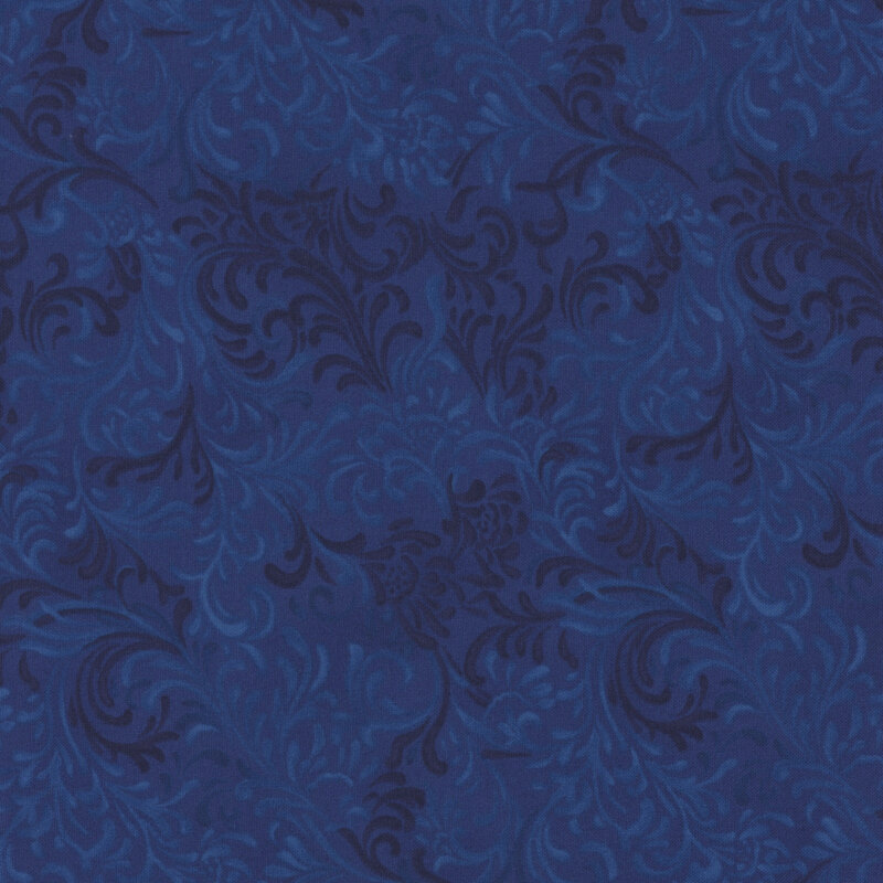 A deep blue fabric with an intricate floral pattern in a slightly darker shade.