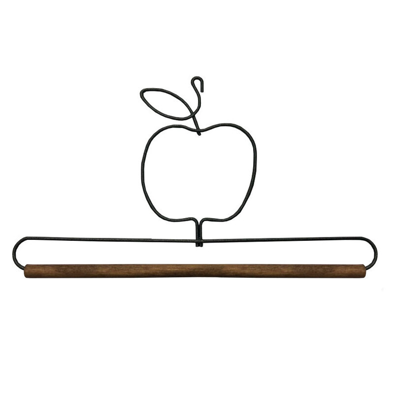 Black wire in the shape of an apple with a wooden rod below, is used for decorative purposes.