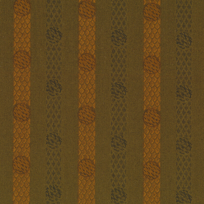 Textured fabric featuring vertical stripes in dark green, orange, and brown, with circular and scale-like patterns interspersed.