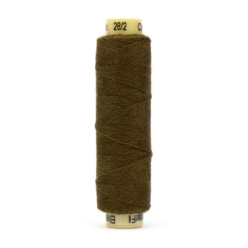 A spool of Ellana EN27 - Bark thread on a white background