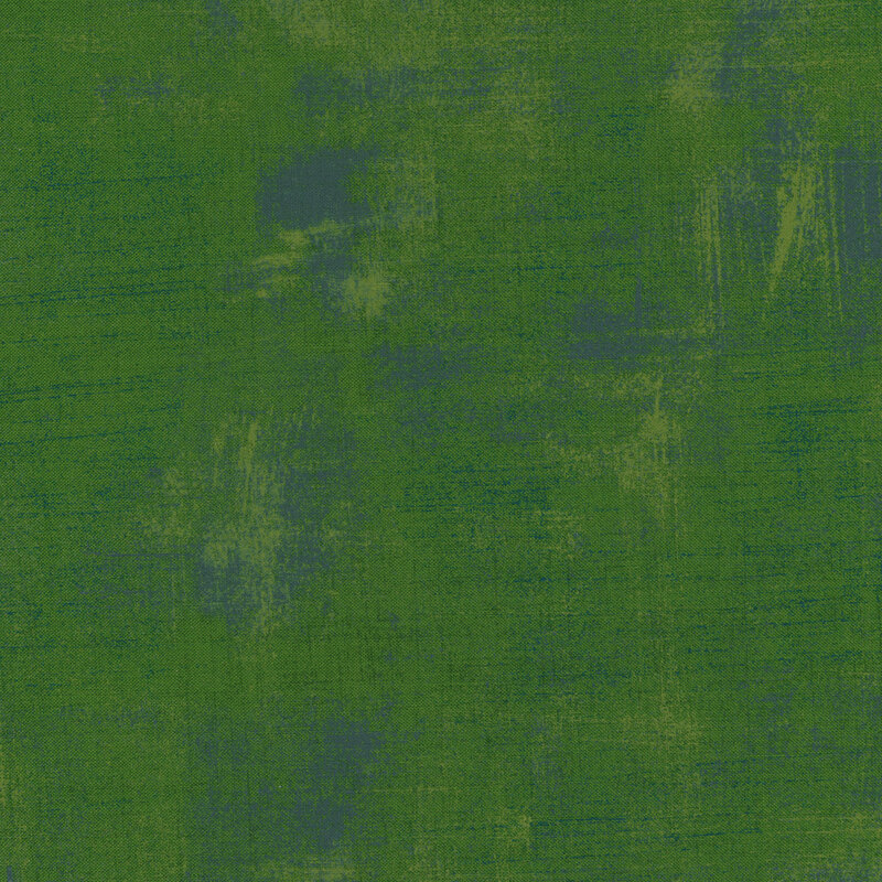 A textured green background with subtle variations in shade and tone.