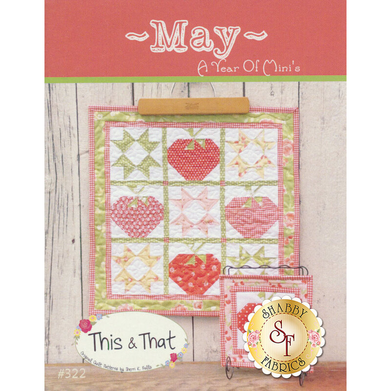 Cover of a quilting pattern booklet titled May: A Year of Mini's, featuring a colorful quilt design with heart shapes in a grid pattern. Includes a smaller image of a quilt square at the bottom right. The design has a pink and green color scheme.