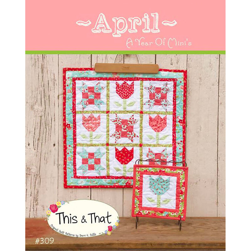 A quilt themed for April, featuring floral patterns in pink, red, and green. There are two quilts displayed: a larger one with a grid design and a smaller one with a tulip motif. The background consists of a wooden texture, and the title at the top reads April with A Year of Mini's below it. A logo for This & That is also visible at the bottom.