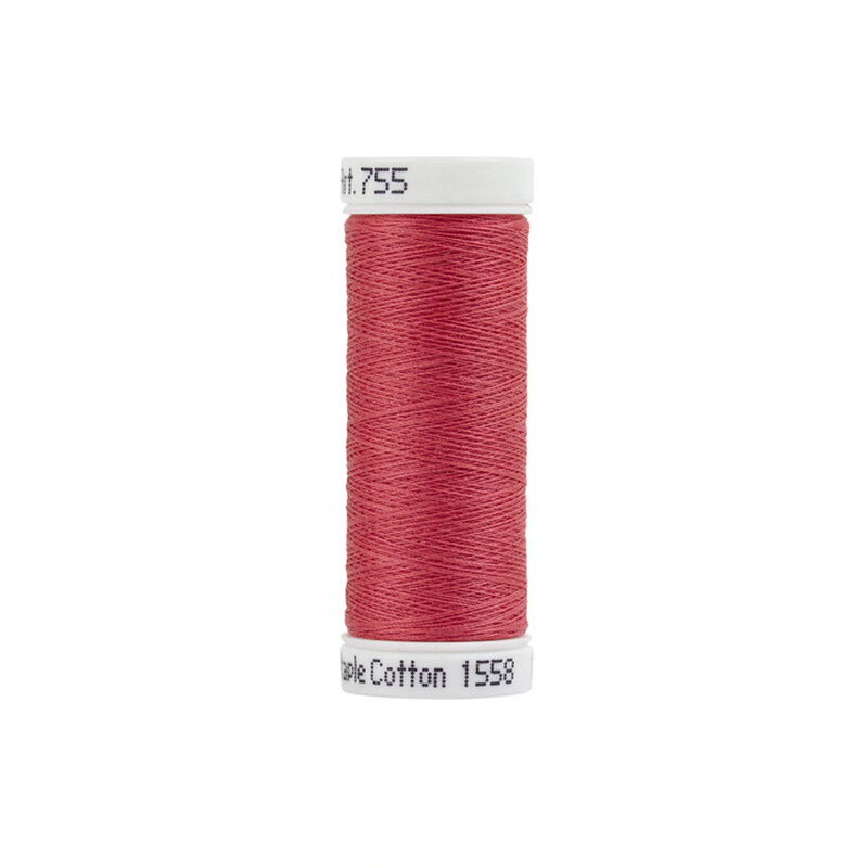 A spool of reddish pink sewing thread with a white label.