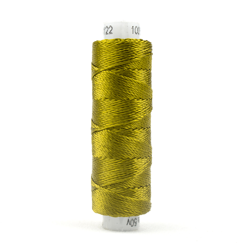 A spool of WonderFil Razzle RZ4122 Ecru Olive thread on a white background