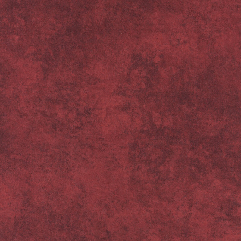 Mottled red swatch of brushed flannel fabric.