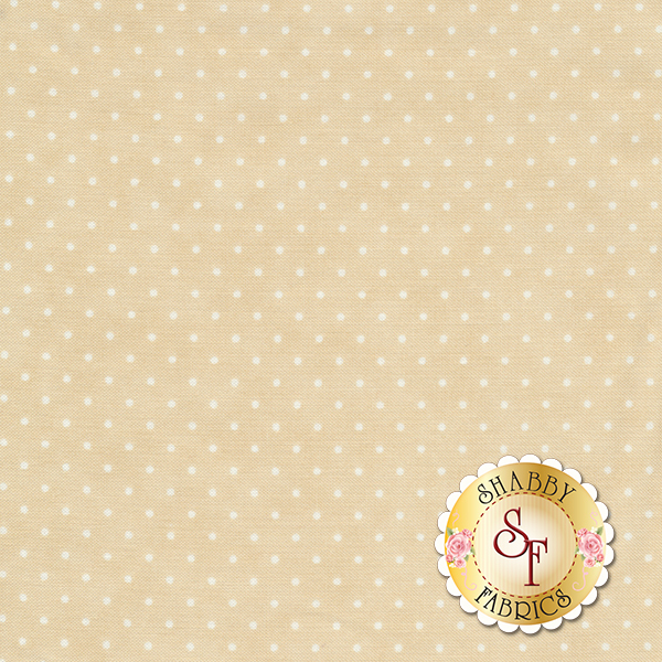 Light tan mottled fabric with small white polka dots all over