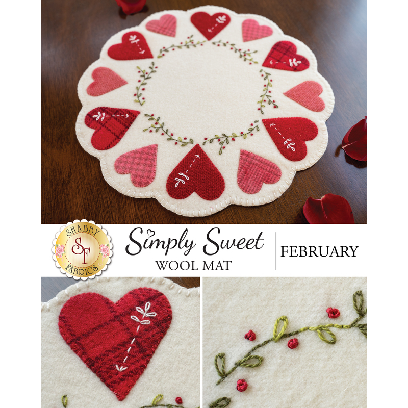 A circular wool mat with a scalloped edge featuring various red and pink hearts arranged around the perimeter. The center of the mat is cream-colored and shows decorative stitching and floral elements. The image includes text at the bottom that reads Simply Sweet Wool Mat February.