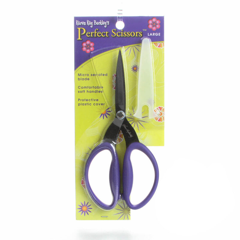 A package featuring large scissors with purple handles and a protective plastic cover.