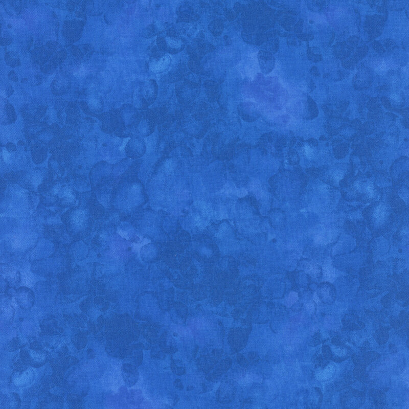 Mottled watercolor style royal blue fabric swatch.