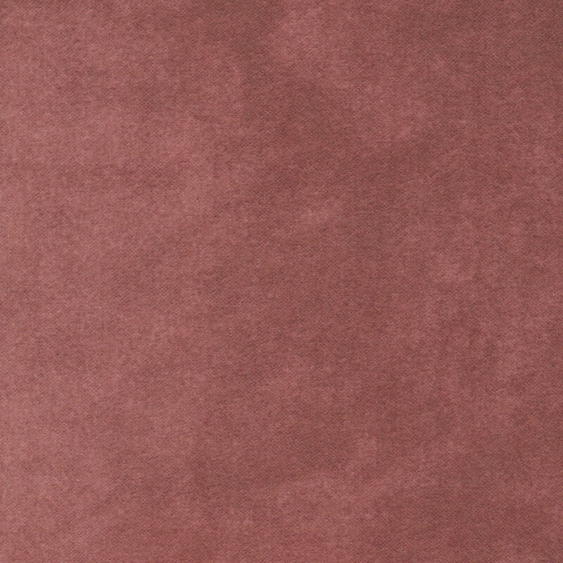 A textured fabric in a warm reddish-brown color.