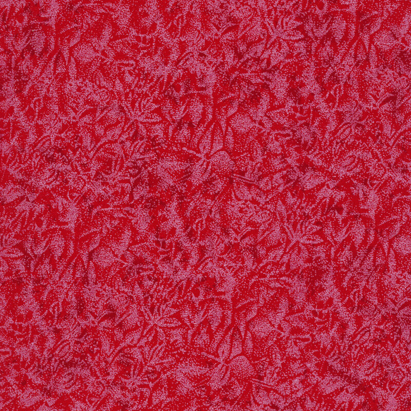 Tonal red fabric features mottled design with metallic frost accents