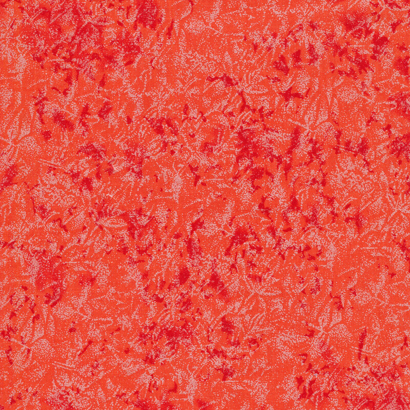 Tonal coral orange fabric features mottled design with metallic frost accents