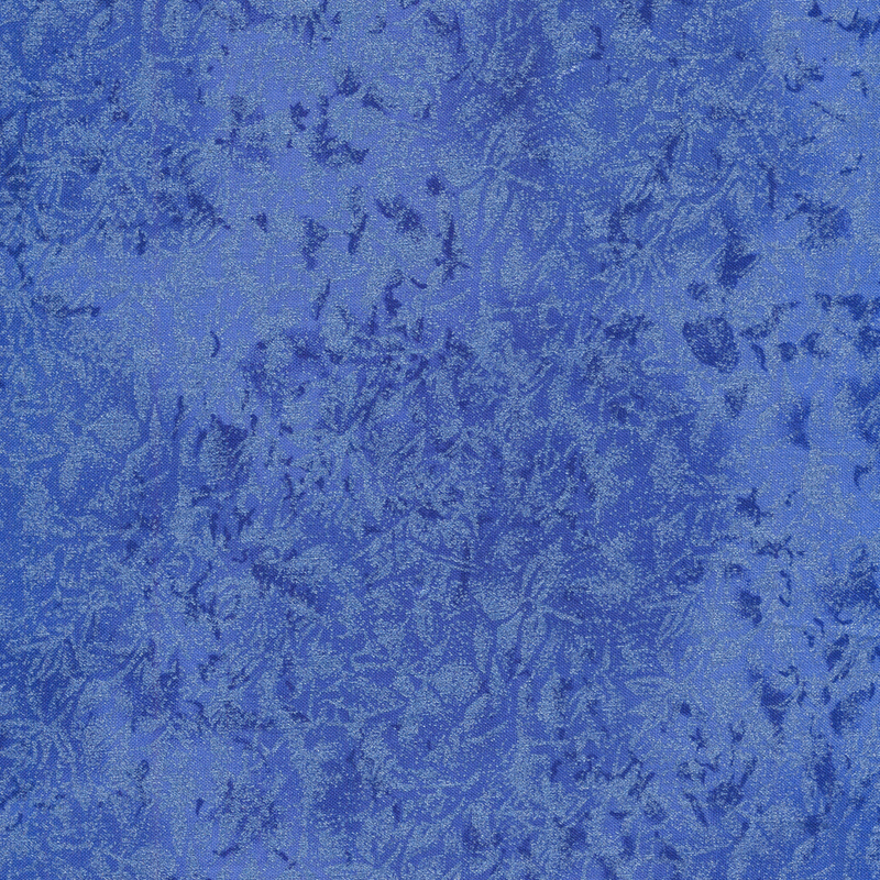 Tonal blue fabric features mottled design with metallic frost accents