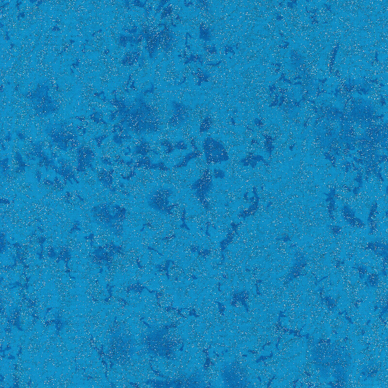 Tonal bright blue fabric features mottled design with metallic glitter accents