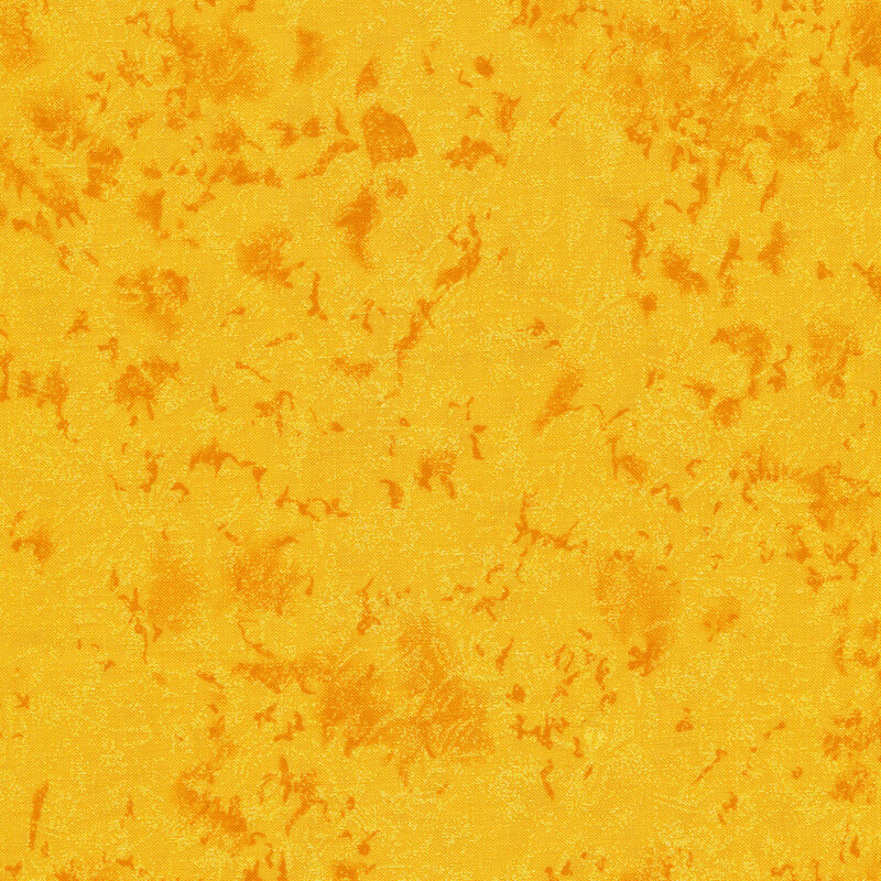 Tonal yellow fabric features mottled design with metallic frost accents