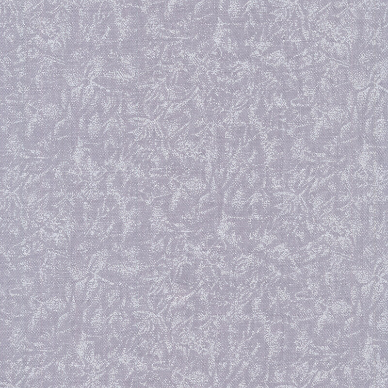 Tonal light gray fabric features mottled design with metallic frost accents