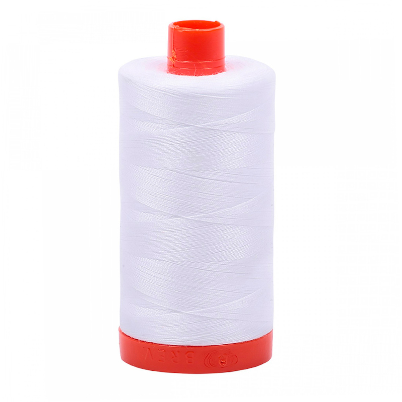 A spool of Aurifil 2024 - White thread on a white background