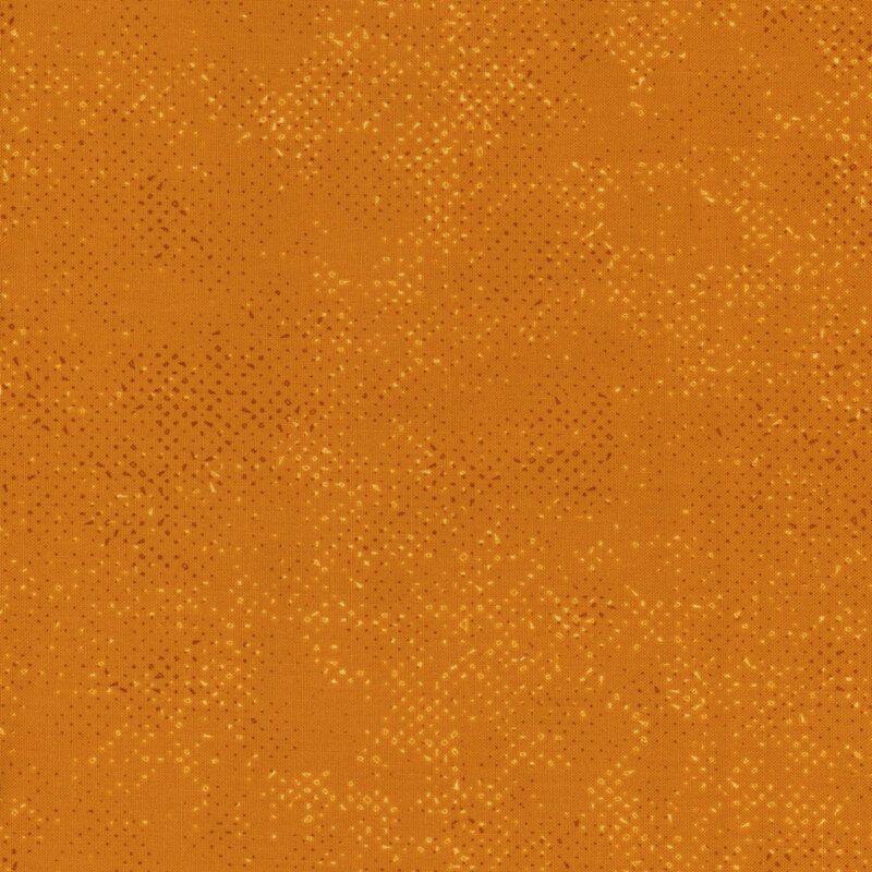 Textured brown fabric with a pattern of small tonal speckles