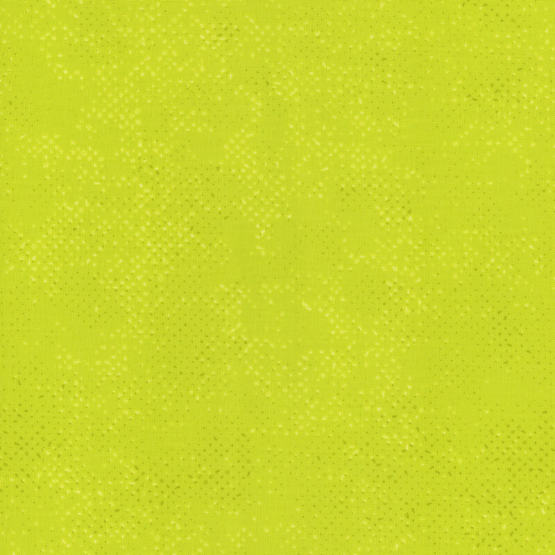 Textured lime green fabric with a pattern of small tonal speckles