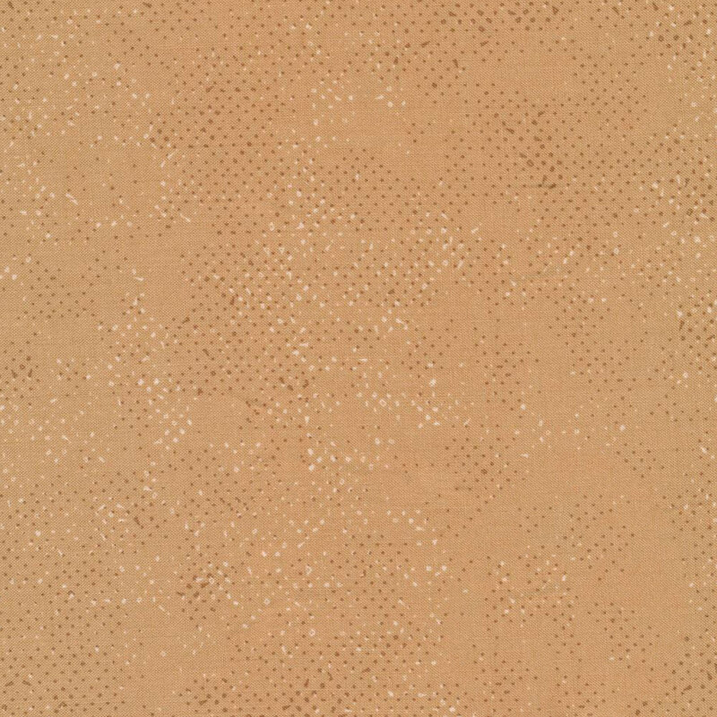 Textured tan fabric with a pattern of small tonal speckles