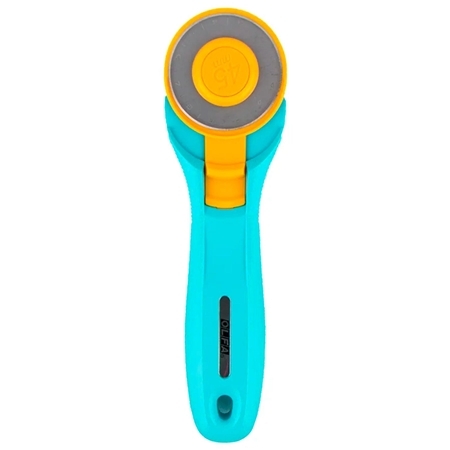 A turquoise rotary cutter with yellow accents and a metallic blade, designed for crafting and sewing.