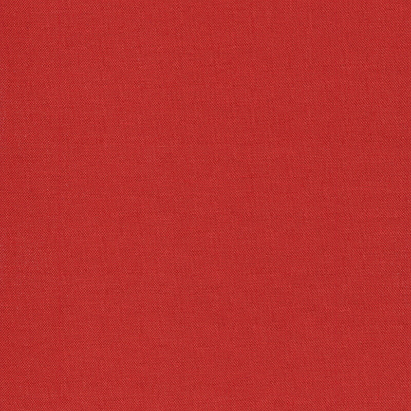 A smooth, solid scarlet red fabric swatch.