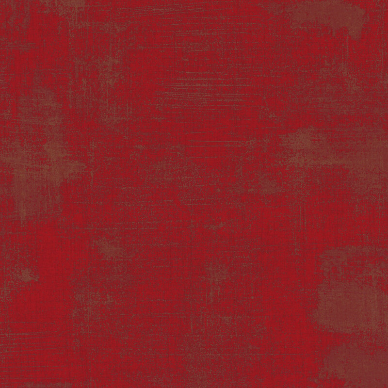 Dark red grunge textured fabric