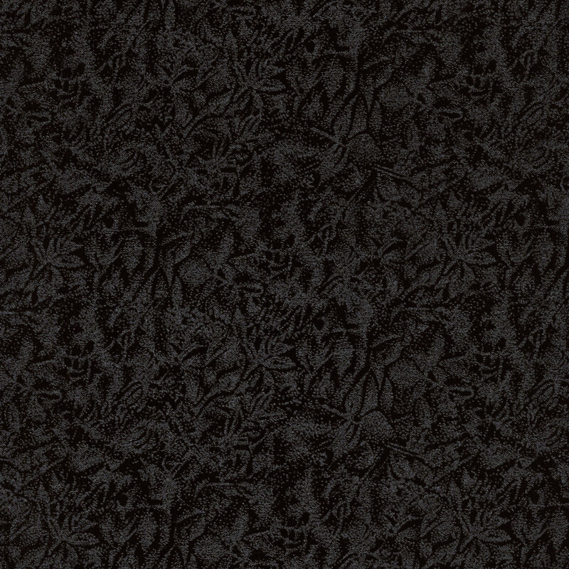 Tonal black fabric features mottled design with metallic frost accents