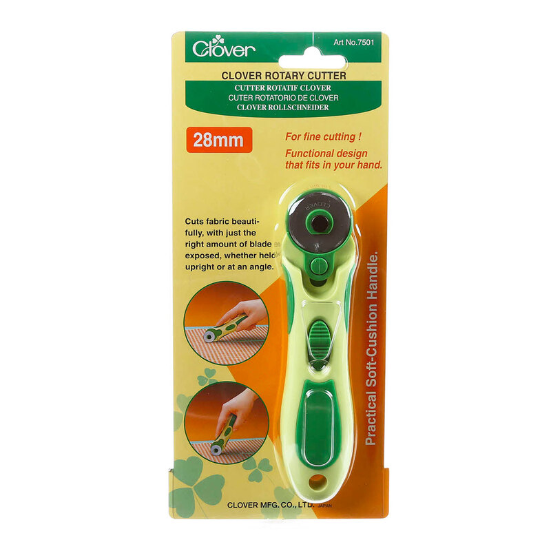 Clover rotary cutter packaging with instructions and a 28mm cutter and blade.