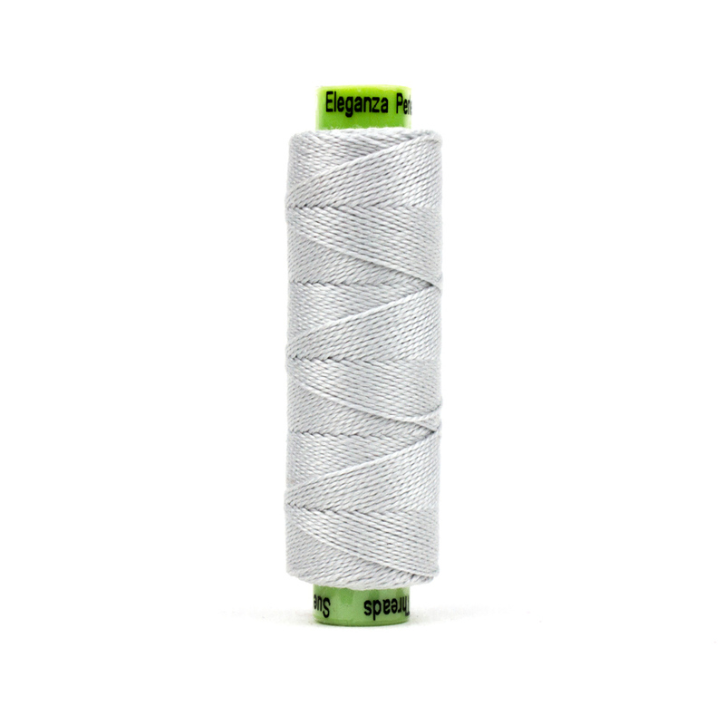 A spool of WonderFil Eleganza EZ37 Cool Ashes thread on a white background