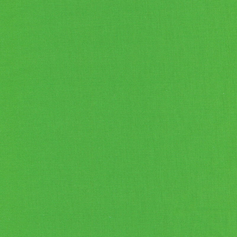 A smooth, solid kelly green fabric swatch.