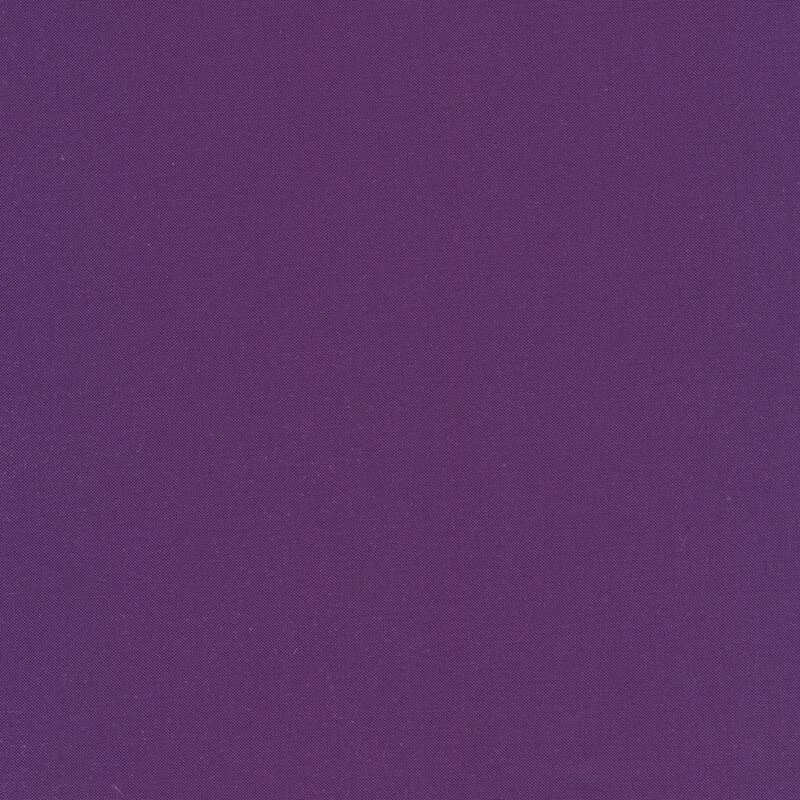 A smooth, solid purple fabric.